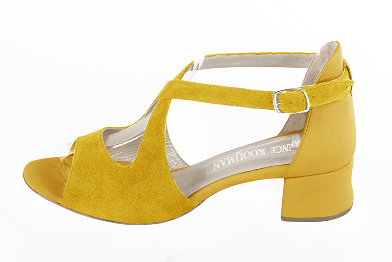 French elegance and refinement for these yellow closed back dress sandals, with crossed straps, 
                available in many subtle leather and colour combinations. This pretty sandal will spare you the discomfort of openwork multi-straps.
It will wrap your forefoot
Its adjustable cross straps will hold your instep.
To be personalized or not, according to your choice of materials and colors.  
                Matching clutches for parties, ceremonies and weddings.   
                You can customize these sandals to perfectly match your tastes or needs, and have a unique model.  
                Choice of leathers, colours, knots and heels. 
                Wide range of materials and shades carefully chosen.  
                Rich collection of flat, low, mid and high heels.  
                Small and large shoe sizes - Florence KOOIJMAN